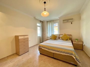 Impeccable Alanya Apartment For Sale – Very spacious bedroom with access to the balcony