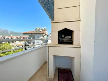 Impeccable Alanya Apartment For Sale – BBQ on balcony