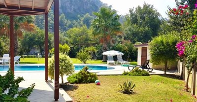 Riverside Dalyan Duplex Apartment For Sale - Beautiful gardens and shared swimming pool