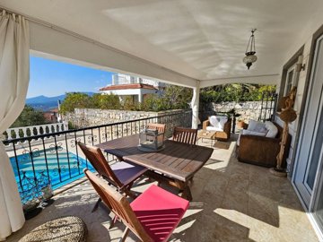 Charming Detached Villa In Fethiye For Sale with Private Pool and Gardens - Very large covered terrace with seating and dining area