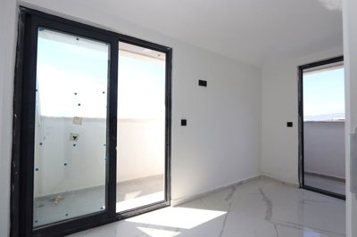 Sea View Duplex Apartment For Sale in Mahmutlar, Alanya - Bedroom one with balcony access