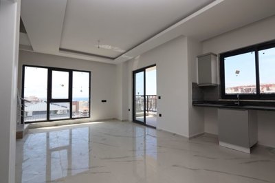 Sea View Duplex Apartment For Sale in Mahmutlar, Alanya - Spacious living area with lots of light
