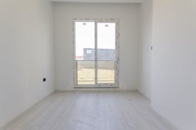 Brand-New Apartment For Sale In Avsallar - Lovely bright and airy bedroom