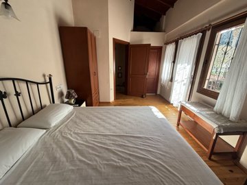 Serene Traditional Dalyan Property For Sale - Master bedroom with balcony and en suite bathroom