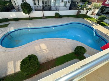 Delightful Apartment In Belek For Sale - Views over the communal pool from the balcony