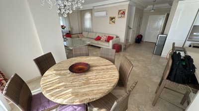 Idyllic Detached Villa For Sale in Belek, Antalya - Dining area and through to the lounge
