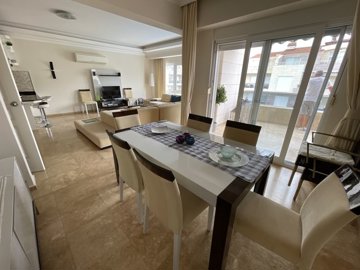 Spacious Duplex Apartment For Sale in Antalya - Large dining area with access to balcony