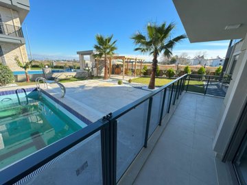 Trendy Apartment In Antalya For Sale - Balcony with pool and garden views