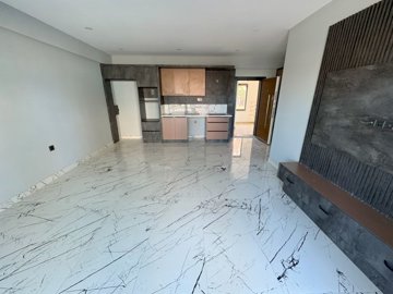 Trendy Apartment In Antalya For Sale - Large living space and fitted kitchen