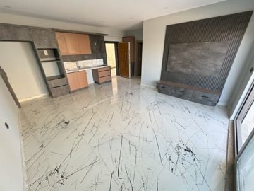 Trendy Apartment In Antalya For Sale - Open-plan living space with balcony access