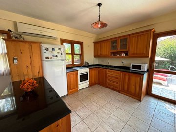 Charming Private Dalyan Property For Sale - Lovely traditional kitchen with access outside