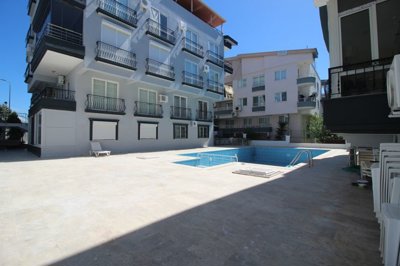 Ideally Located 3-Bedroom Didim Property For Sale – Main view of apartment block and shared pool