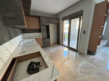Exceptional Belek Apartment In Antalya For Sale - A large modern kitchen