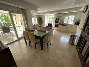 Outstanding Detached Villa For Sale in Belek - Large dining space in the open-plan living area
