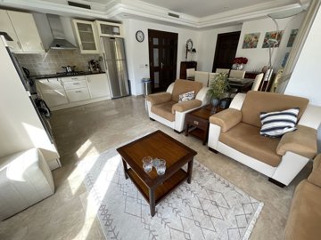 Outstanding Detached Villa For Sale in Belek - Fully furnished lounge through to the kitchen