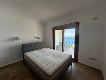 A Must-See Duplex Apartment For Sale In Bodrum - Large double bedroom with glorious sea and nature views