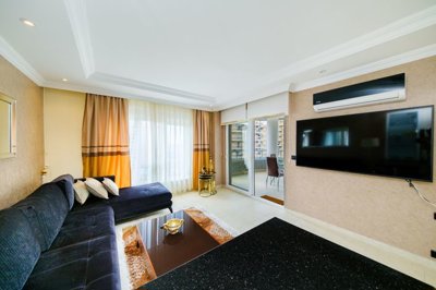 A Chic Sea View Apartment For Sale in Mahmutlar, Alanya - Modern, stylish lounge with balcony