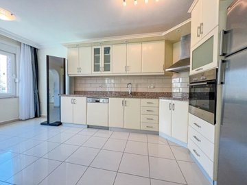 A Must-See Alanya Property For Sale – A very spacious modern kitchen with access to balcony