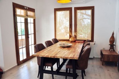 Uniquely Designed Fethiye Property For Sale – Dining area with pretty garden views