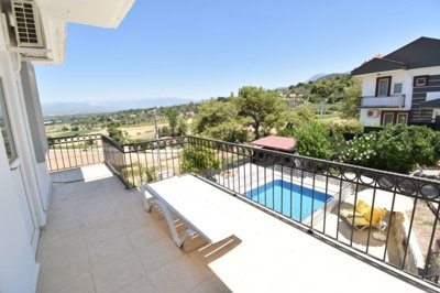 Charming 3-Bed Fethiye Property For Sale - Pool and nature views from the bedroom