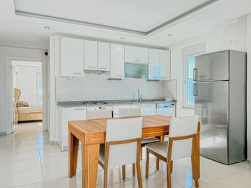 A Pristine Apartment For Sale In Avsallar - View from lounge area to kitchen