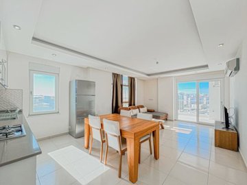 A Pristine Apartment For Sale In Avsallar - View from kitchen to lounge area