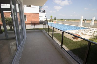 Exclusive Belek Antalya Apartment For Sale - Balcony with pool and nature views