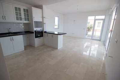 Exclusive Belek Antalya Apartment For Sale - A modern kitchen and spacious living area