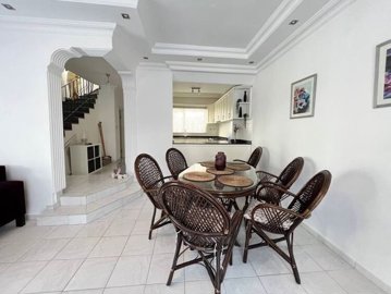 Delightful Triplex Villa In For Sale In Belek - Dining area with a view to the kitchen