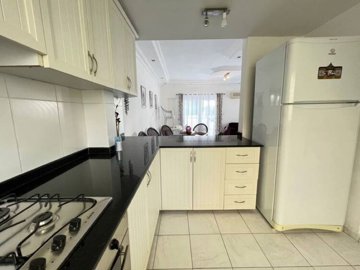 Delightful Triplex Villa In For Sale In Belek - Large fully fitted modern kitchen with white goods
