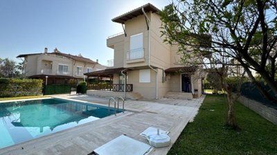 An Outstanding Triplex Villa In For Sale In Belek - A spacious home with private pool and gardens