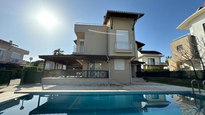 An Outstanding Triplex Villa In For Sale In Belek - A large private pool
