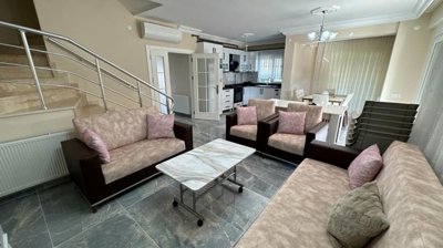 An Outstanding Triplex Villa In For Sale In Belek - A large open-plan living space