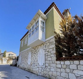 A Beautiful Stone-Built Duplex Alacati Property For Sale - View of villa from the street