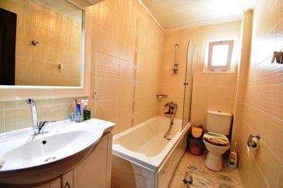 Must-See Garden Floor Apartment In Fethiye For Sale -  - Bathroom with full bathtub and shower