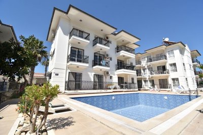 Must-See Garden Floor Apartment In Fethiye For Sale - A pretty complex with pool and established gardens