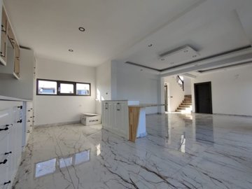 Prime Location Villa For Sale in Antalya - Elegant living space with flowing layout