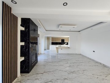 Prime Location Villa For Sale in Antalya - A very stylish fireplace in the living space