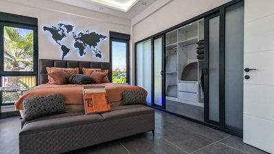 Smart-Home Villa For Sale in Antalya - Modern double bedroom with built-in storage