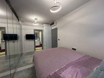 Sea View Bodrum Apartment In Bardakci Koyu For Sale – Double bedroom featuring an ensuite bathroom
