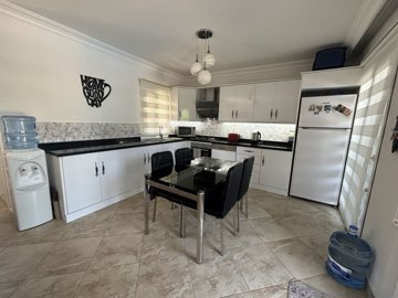 A charming Dalyan Private Villa For Sale With Pool - View from the lounge to the kitchen and dining area
