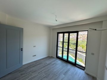 A Beautiful Duplex Villa In Bodrum For Sale - Double bedroom with pool views