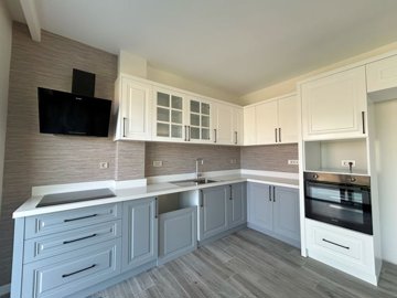 A Beautiful Duplex Villa In Bodrum For Sale - A gorgeous kitchen with built-in white goods