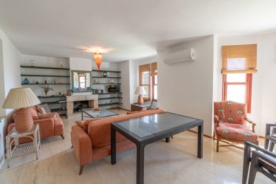 Pristine Semi-Detached Gocek Property in Fethiye For Sale - Gorgeous lounge with a fireplace