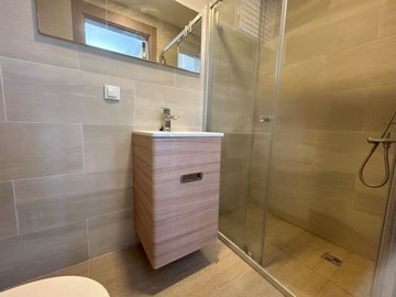 A Modern, Spacious Apartment For Sale On a Small Complex - Modern bathroom