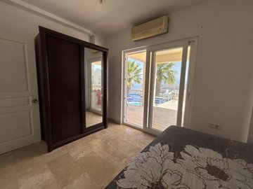 Exquisite  Villa For Sale With Sea Views Near Bodrum - Spacious double bedroom with terrace to the pool