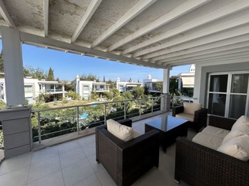 A Delightful Apartment In Bodrum For Sale - Large balcony with pool and garden views