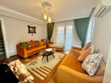 An Expansive Duplex Property For Sale In Fethiye – Second bedroom used as a second lounge with balcony