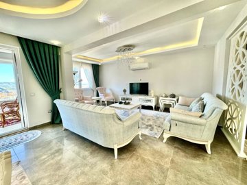 An Expansive Duplex Property For Sale In Fethiye – Lounge area with balcony access