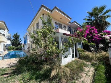 A Fully Furnished Duplex Apartment in Dalyan For Sale - Main view of the property and communal pool